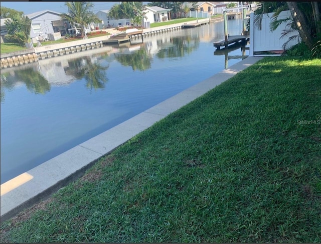 property view of water featuring a dock