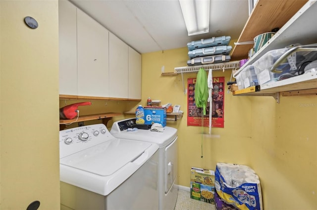 1050 Riverside Dr Unit A201, Palmetto, FL 34221 - clothes washing area with independent washer and dryer and cabinet space