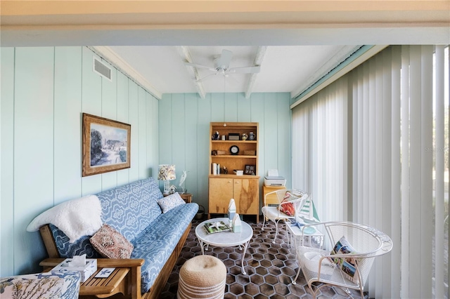 living room with ceiling fan