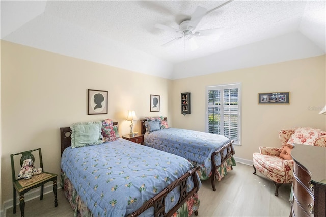 bedroom featuring a textured ceiling and ceiling fan