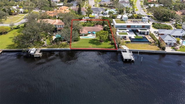 aerial view featuring a residential view and a water view