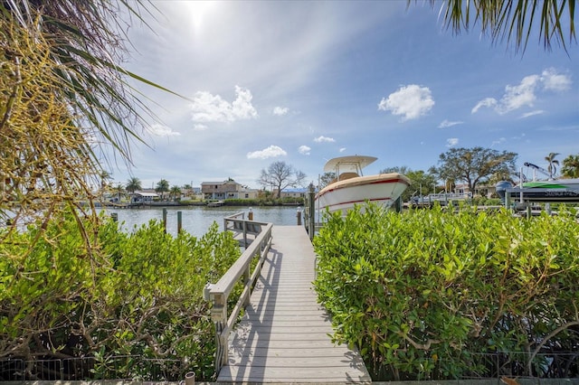 dock area featuring a water view