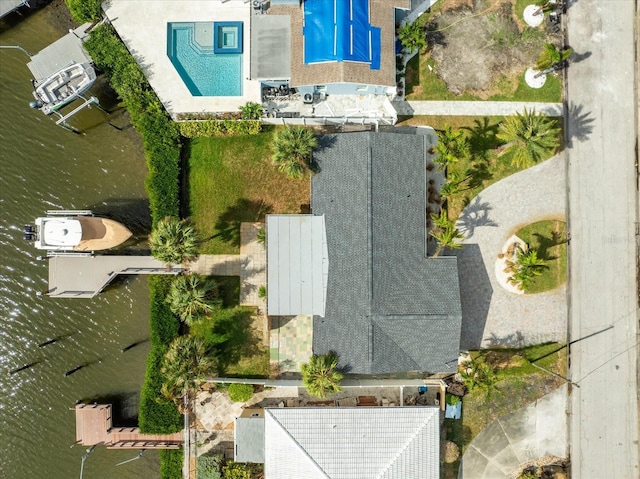 bird's eye view with a water view