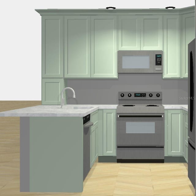 411 S Fremont Ave Unit B, Tampa, FL 33606 - kitchen with electric stove, white microwave, green cabinets, and a sink