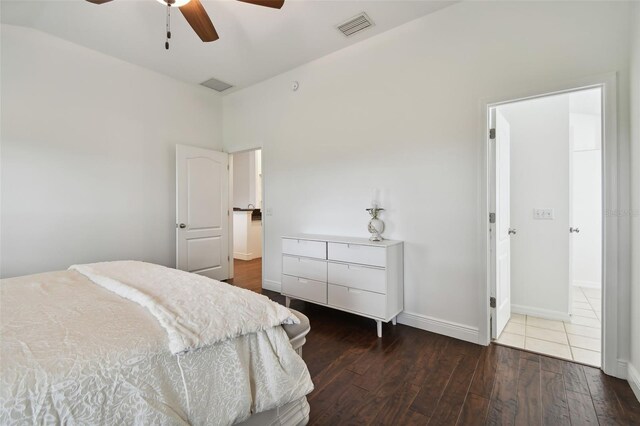 bedroom with dark wood-type flooring and ceiling fan