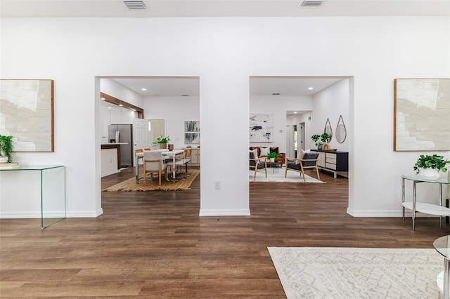 foyer entrance featuring dark hardwood / wood-style flooring