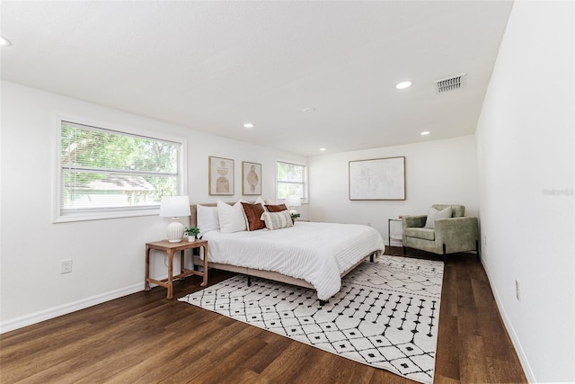 bedroom featuring dark wood-type flooring