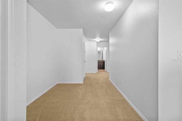 hall with light carpet