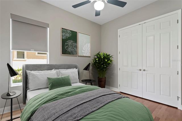 bedroom featuring a closet, ceiling fan, and hardwood / wood-style flooring