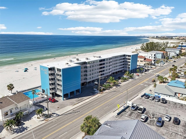 drone / aerial view with a view of the beach and a water view