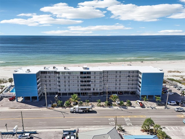 bird's eye view with a beach view and a water view