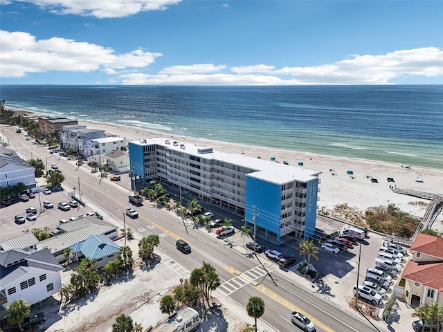 aerial view featuring a water view and a beach view