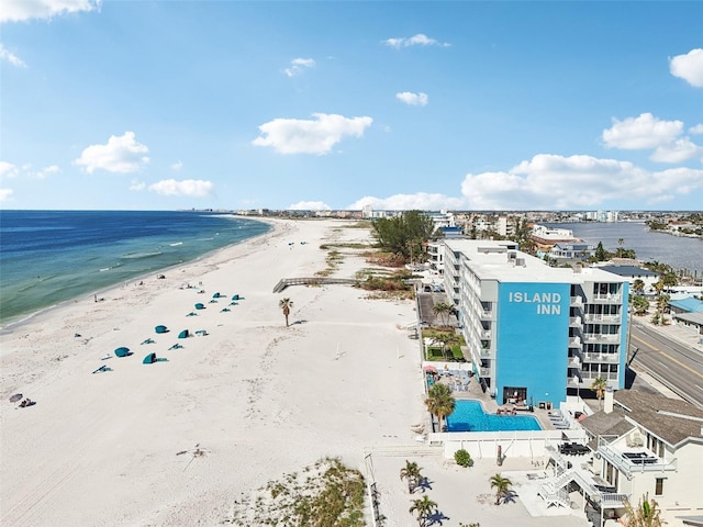 bird's eye view with a water view and a view of the beach