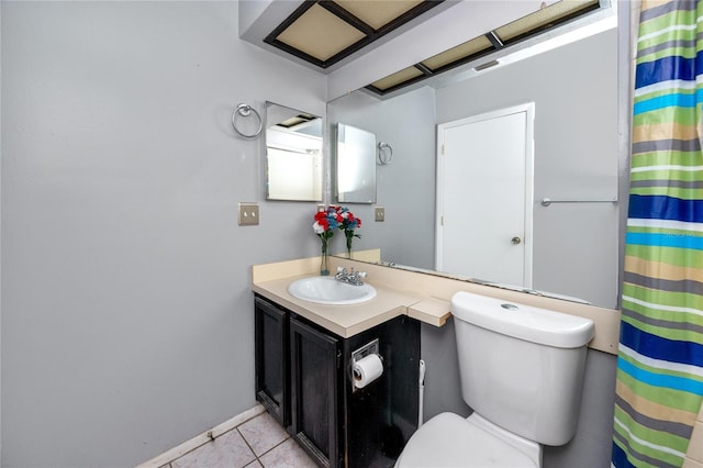 bathroom featuring toilet, a shower with shower curtain, visible vents, vanity, and tile patterned floors