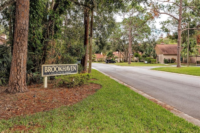 view of road featuring curbs