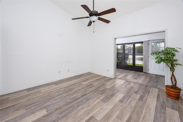 empty room featuring ceiling fan and wood finished floors