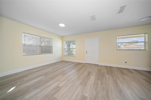 empty room with light wood-type flooring