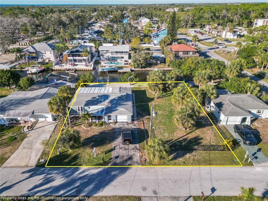 bird's eye view with a water view