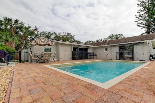 view of pool with a patio