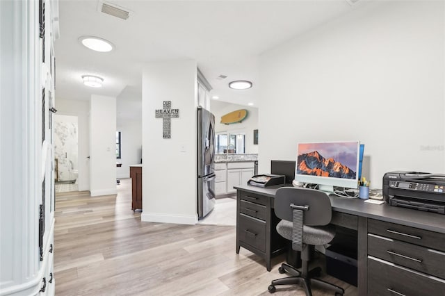 office space featuring light hardwood / wood-style flooring