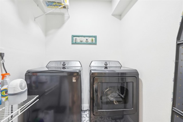 laundry room featuring washer and dryer