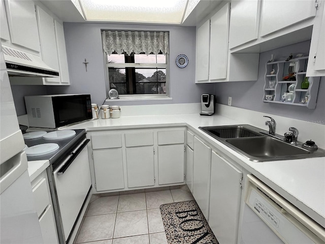 kitchen with white cabinets, white appliances, and sink