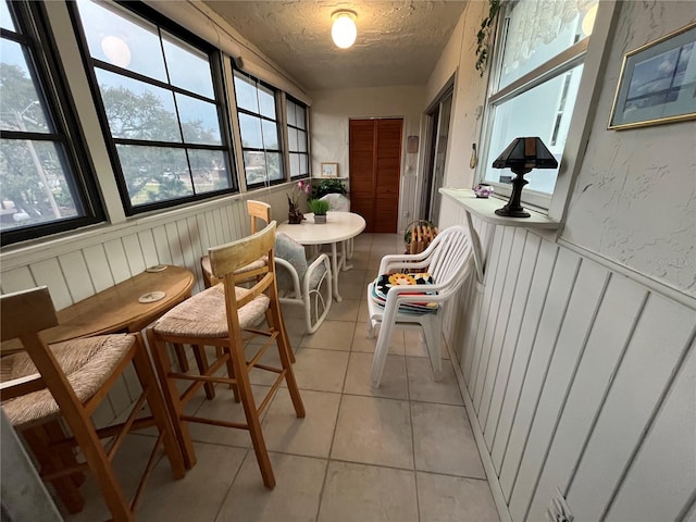 sunroom / solarium featuring a wealth of natural light