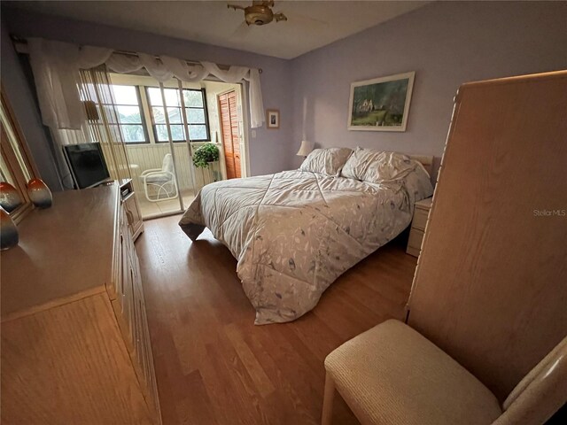 bedroom featuring light wood-type flooring and ceiling fan