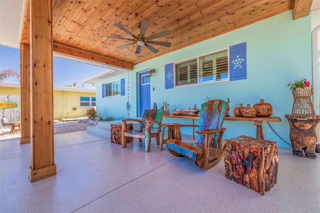 view of patio featuring ceiling fan