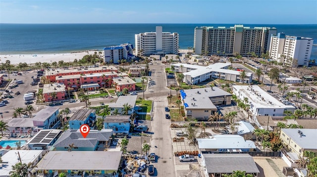 aerial view featuring a water view and a view of the beach