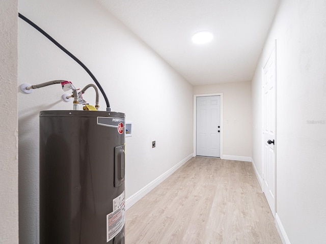 utility room with water heater