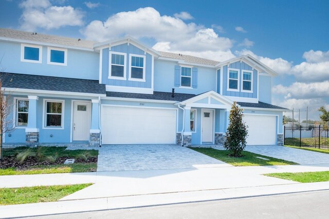 view of front of home with a garage