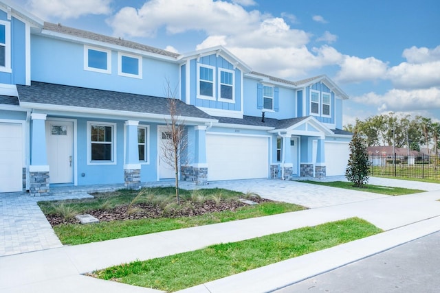 view of front of property featuring a garage