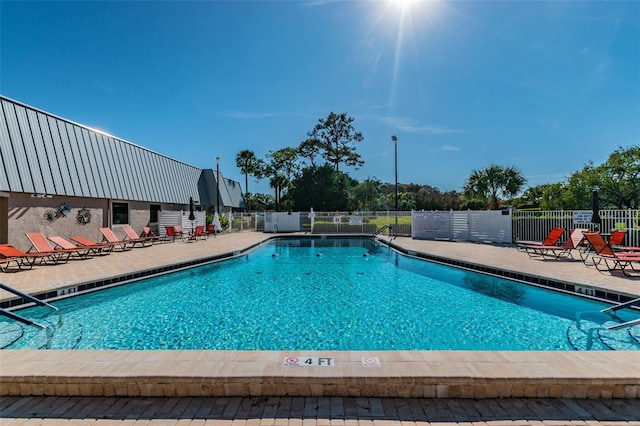 view of pool featuring a patio