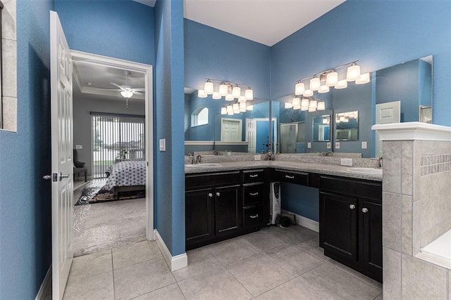 bathroom featuring vanity, ceiling fan, and tile patterned floors