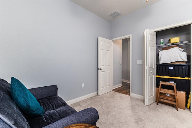 living area featuring carpet flooring