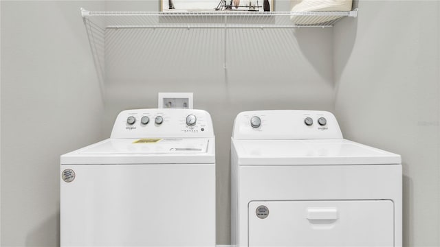 laundry area featuring independent washer and dryer