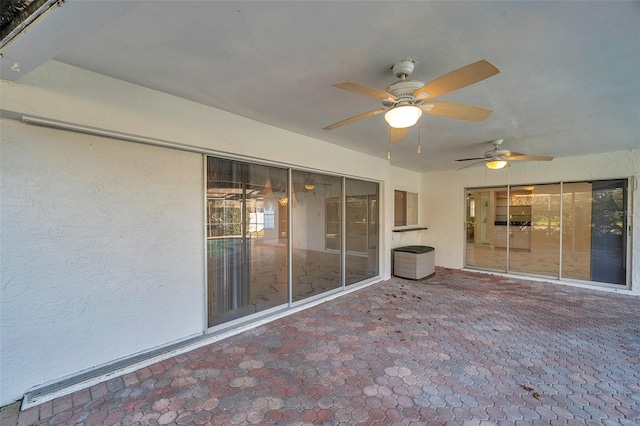 view of patio / terrace featuring ceiling fan