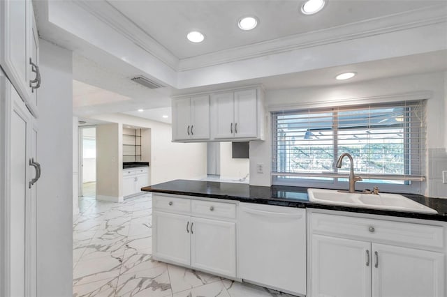 kitchen featuring white dishwasher, white cabinets, sink, and ornamental molding