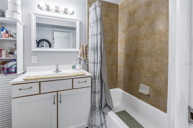 bathroom with vanity and shower / bathtub combination with curtain