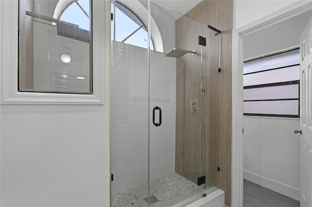 bathroom featuring walk in shower