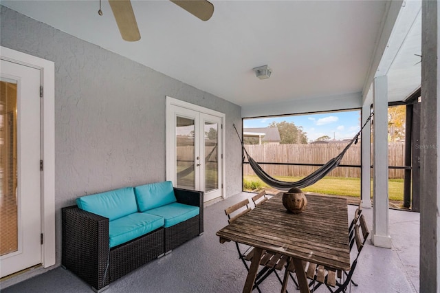 sunroom / solarium with ceiling fan