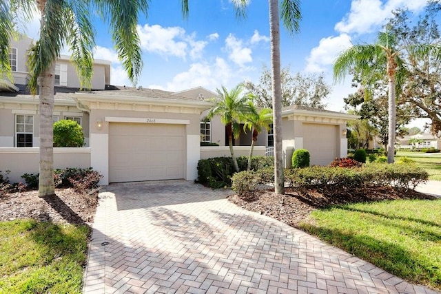 ranch-style home with a garage