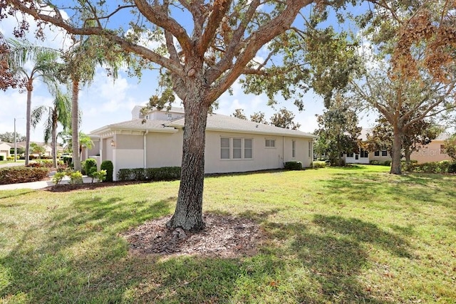 exterior space with a lawn