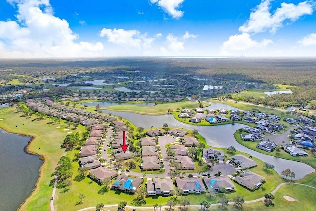 birds eye view of property featuring a water view