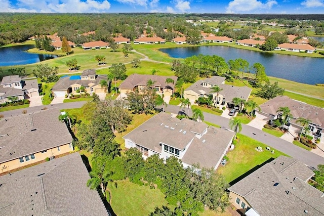 drone / aerial view with a water view