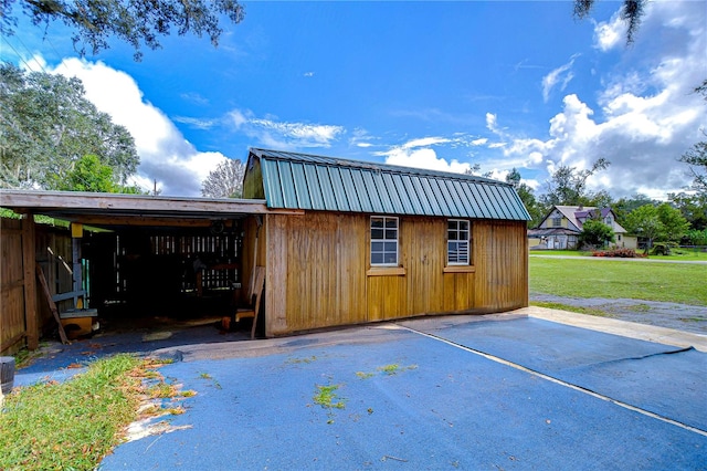 exterior space with a yard