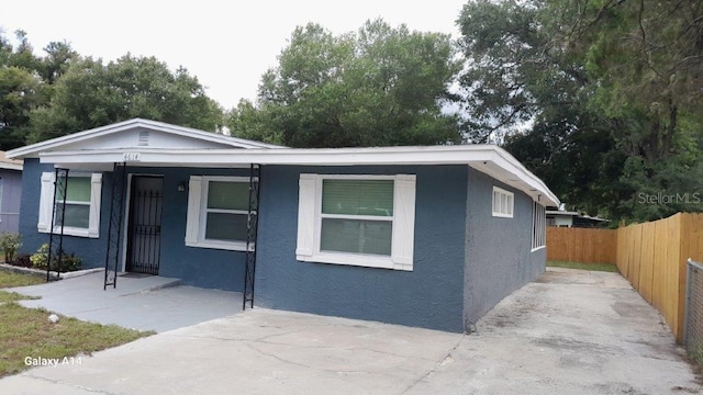 view of front of home with a patio area