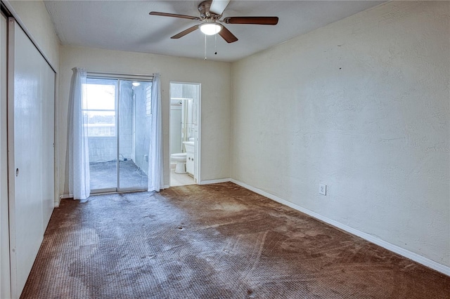 empty room featuring carpet and ceiling fan