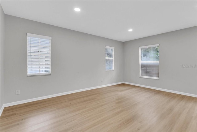 empty room with light wood-type flooring